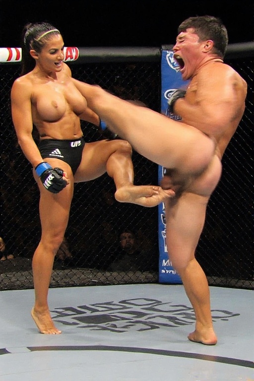 Woman pins man to the floor and ruptures his balls